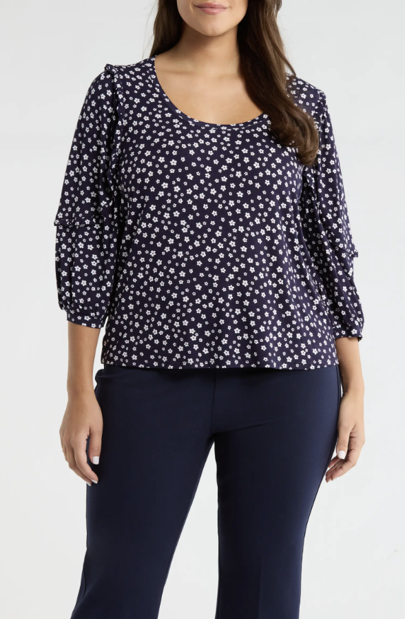 Liverpool printed blouse with loose ruffle sleeves for comfortable upper-arm coverage.