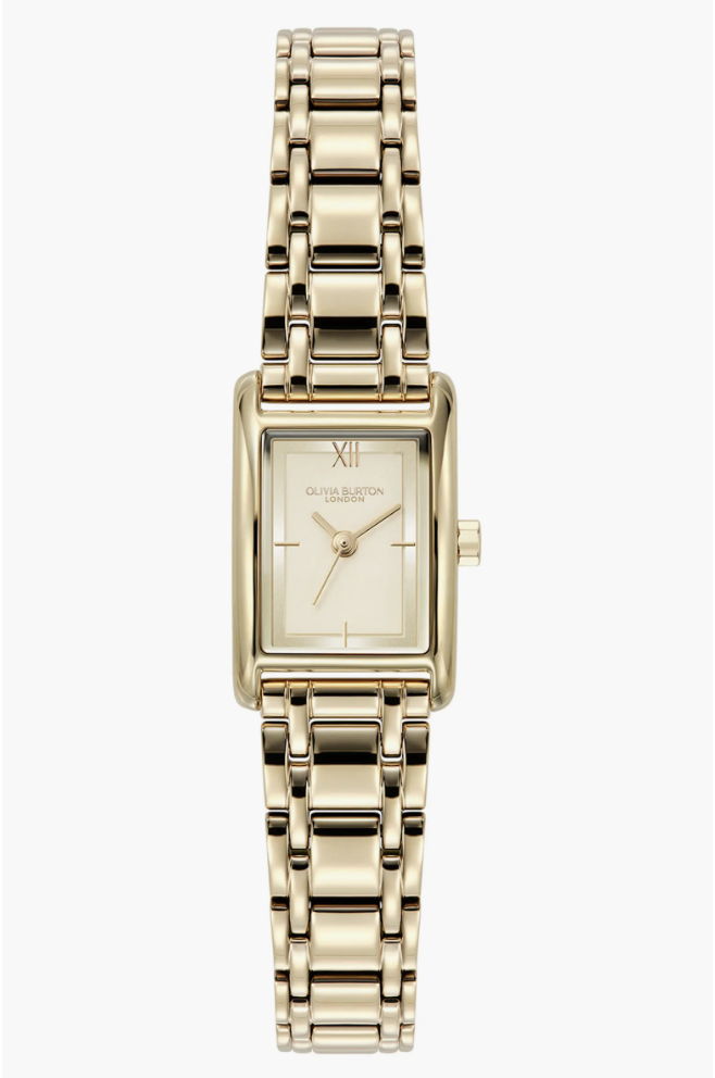 A gold-tone Olivia Burton Mini Grove rectangular bracelet watch with a matching gold face and classic link band.