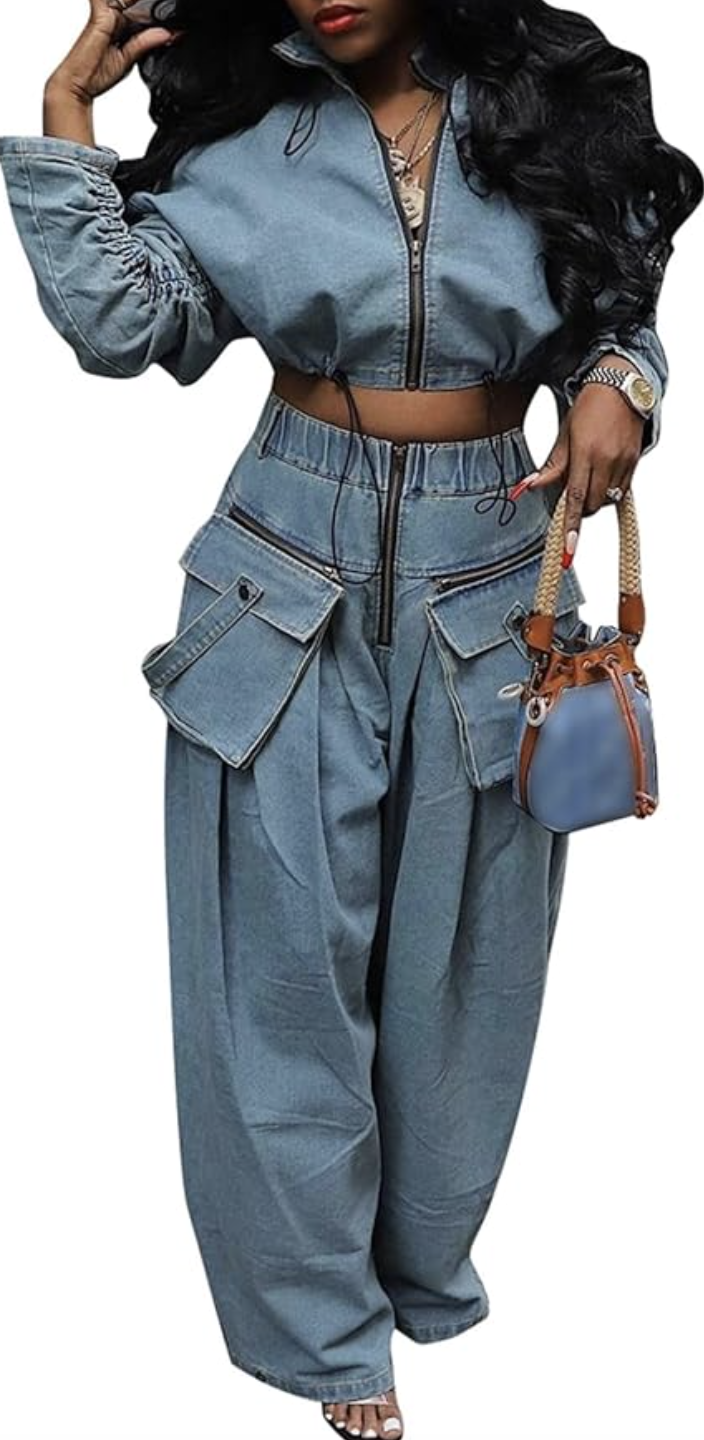 A person wearing high-waisted blue denim-style wide-leg cargo pants featuring oversized front flap pockets and a unique zip-front waist detail.