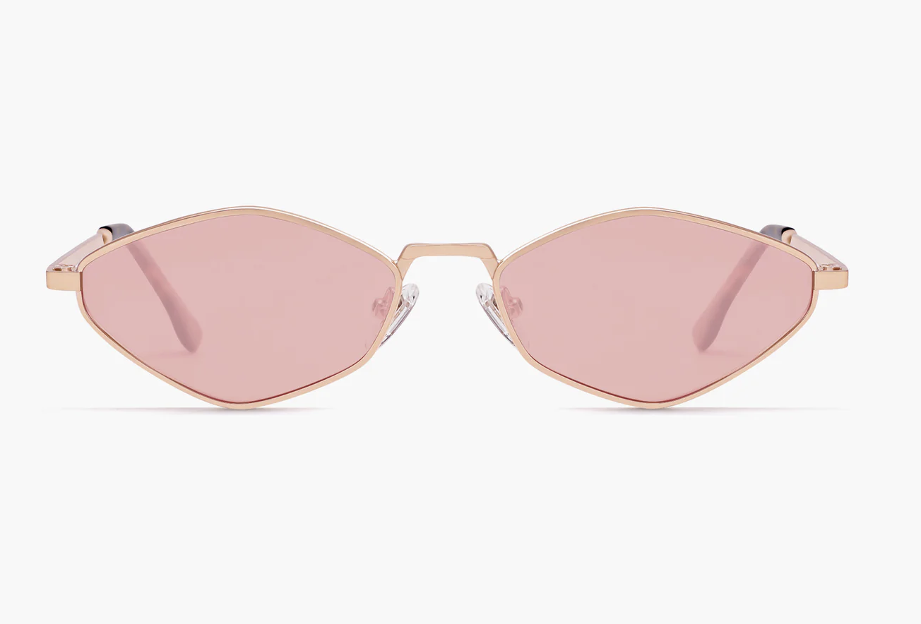 Woman wearing black oversized shield sunglasses with a thick frame, showcasing the 2026 bug-eye eyewear trend.