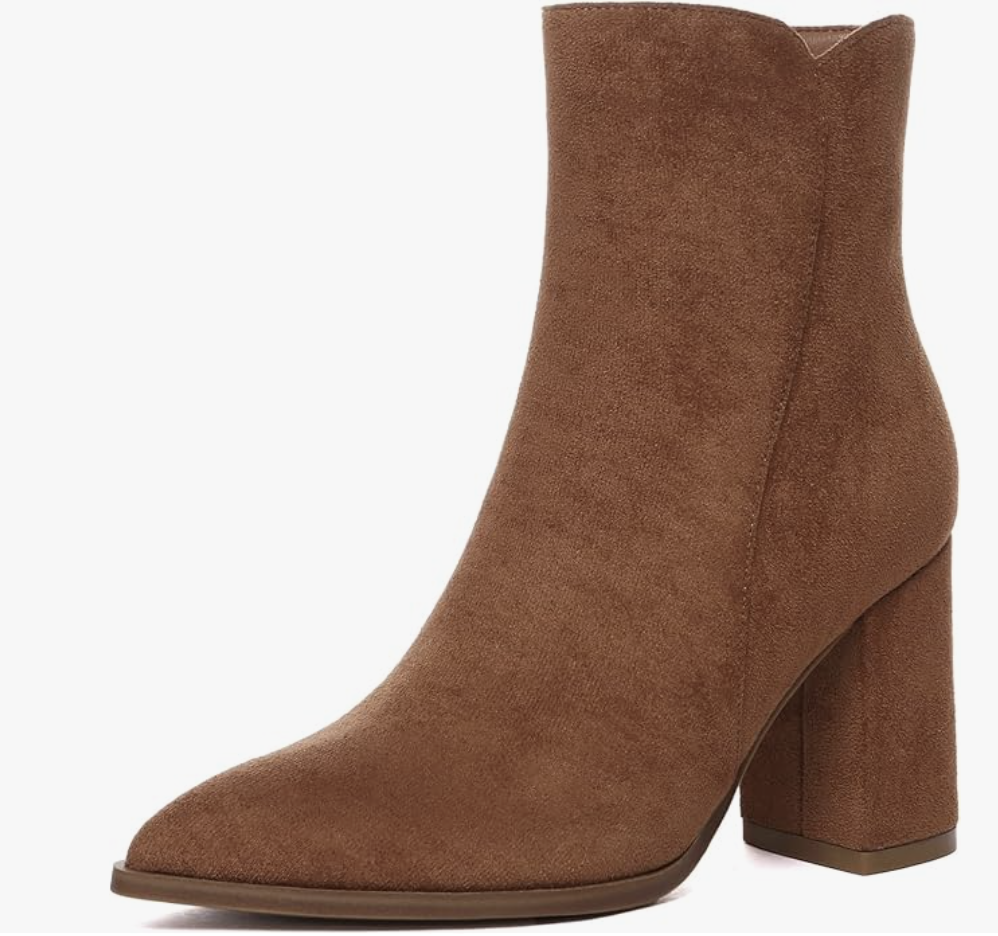 A studio product shot of a brown suede heeled ankle boot from Amazon, featuring a block heel and a pointed toe design.