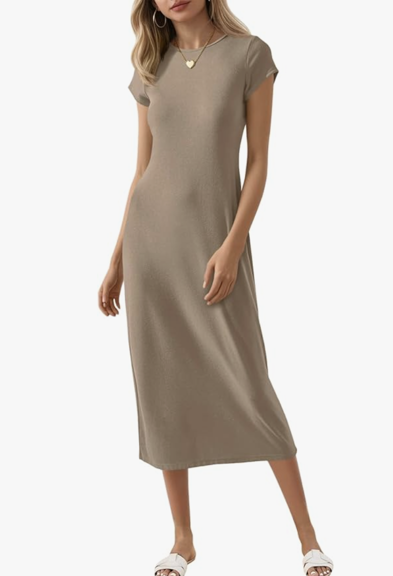 Woman wearing a taupe short sleeve T-shirt midi dress with a round neckline and relaxed fit.
