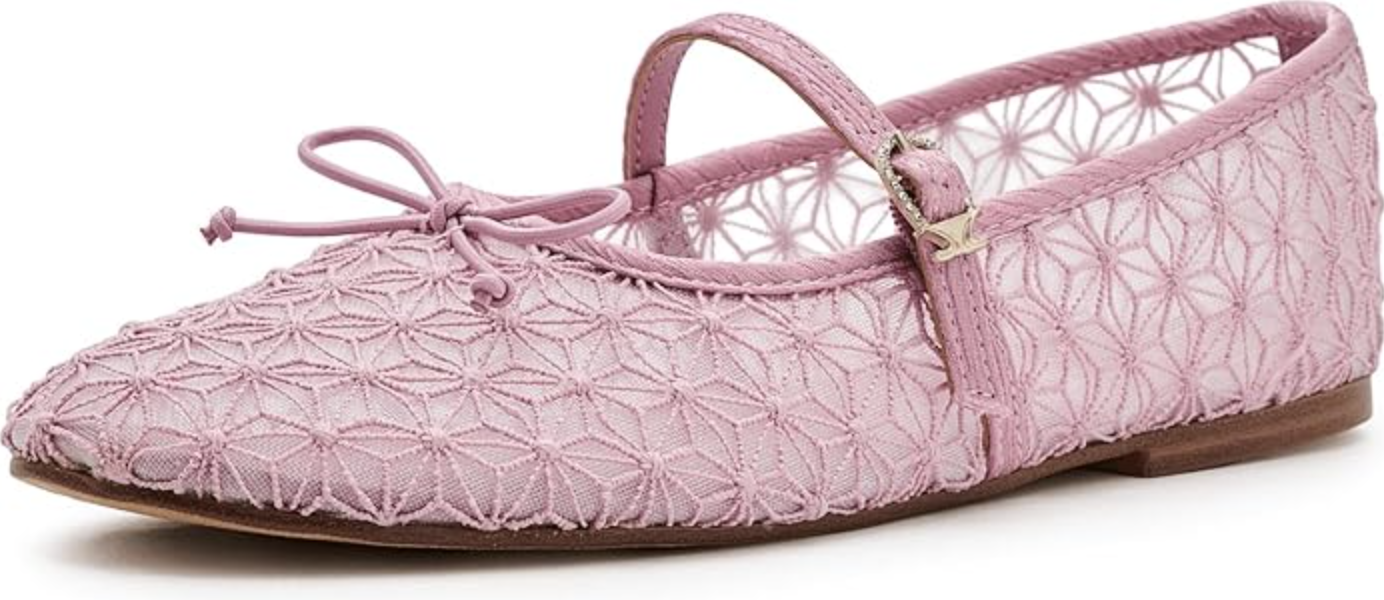 A close-up view of a pair of modern light pink ballet flats featuring a breathable floral mesh pattern, a delicate Mary Jane strap with a silver buckle, and a tiny front bow detail.