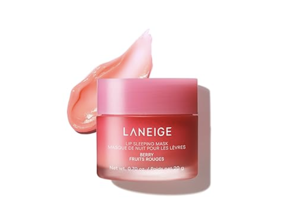 A pink jar of LANEIGE Lip Sleeping Mask in Berry scent, shown with a smear of the glossy pink product next to the container.
