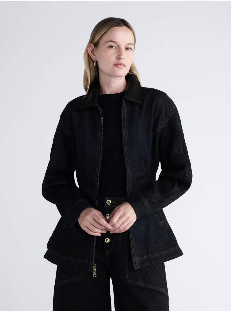 Scoop denim jacket with a fitted waist and peplum hem.