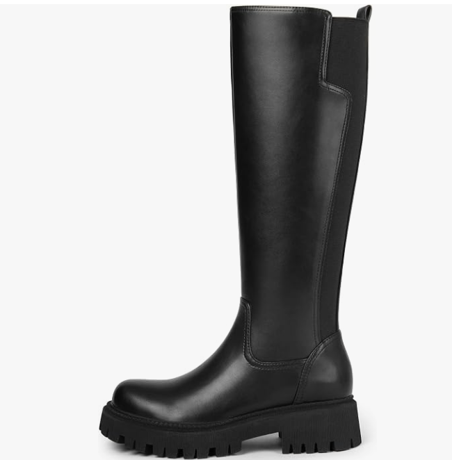 Women's black faux-leather knee-high boot featuring a stretch back calf panel, round toe, side zipper, and a chunky lug platform sole.