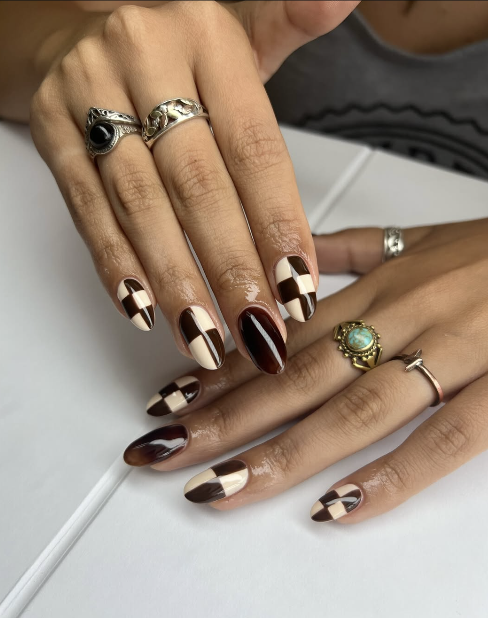 September nail idea featuring brown checkerboard