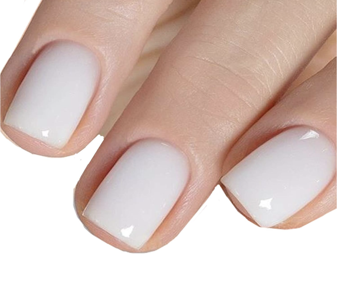 A close-up of a high-shine, milky white gel manicure on short nails, demonstrating the sheer soap nail aesthetic.