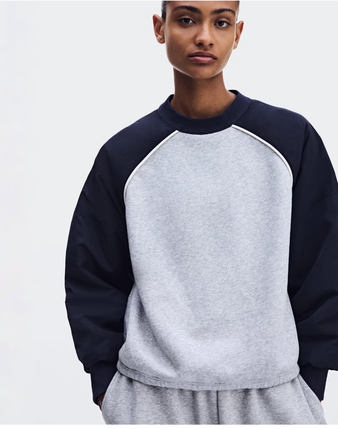 Oversized On crewneck and sweatpants with adjustable bungee details from Zendaya and Law Roach’s collection.