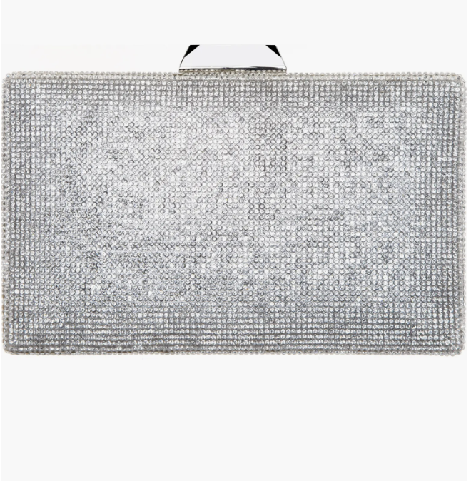 A rectangular hard-case evening clutch bag completely covered in shimmering silver crystal rhinestones, featuring a metallic silver top clasp.