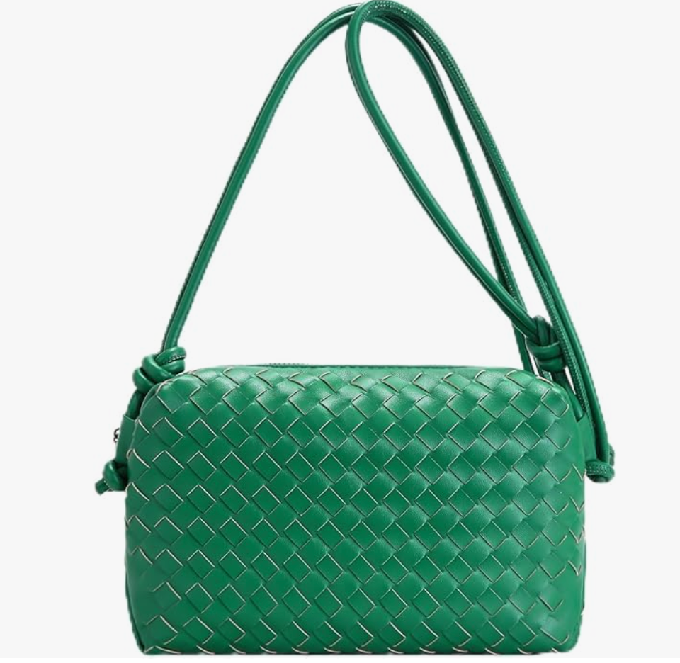 A vibrant green handwoven vegan leather handbag with a minimalist top handle and a compact, rectangular silhouette.