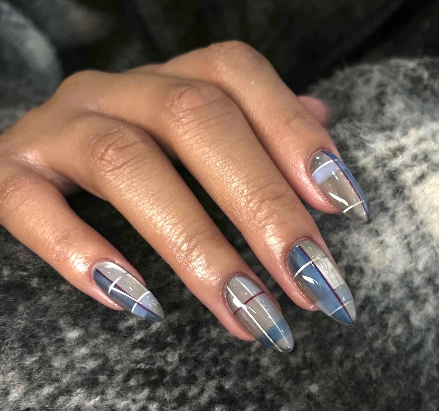 Collage of short winter nail ideas featuring red, brown, chrome, French tip and neutral manicures