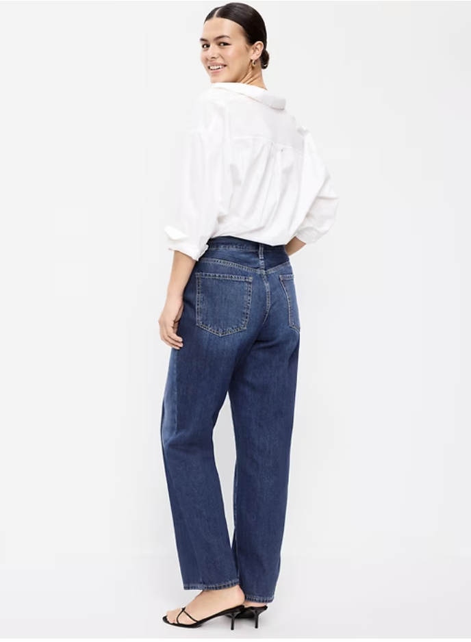 A woman wearing Old Navy High-Waisted OG Loose Rigid Jeans in a dark wash, styled with loafers to show off the petite-friendly ankle length.