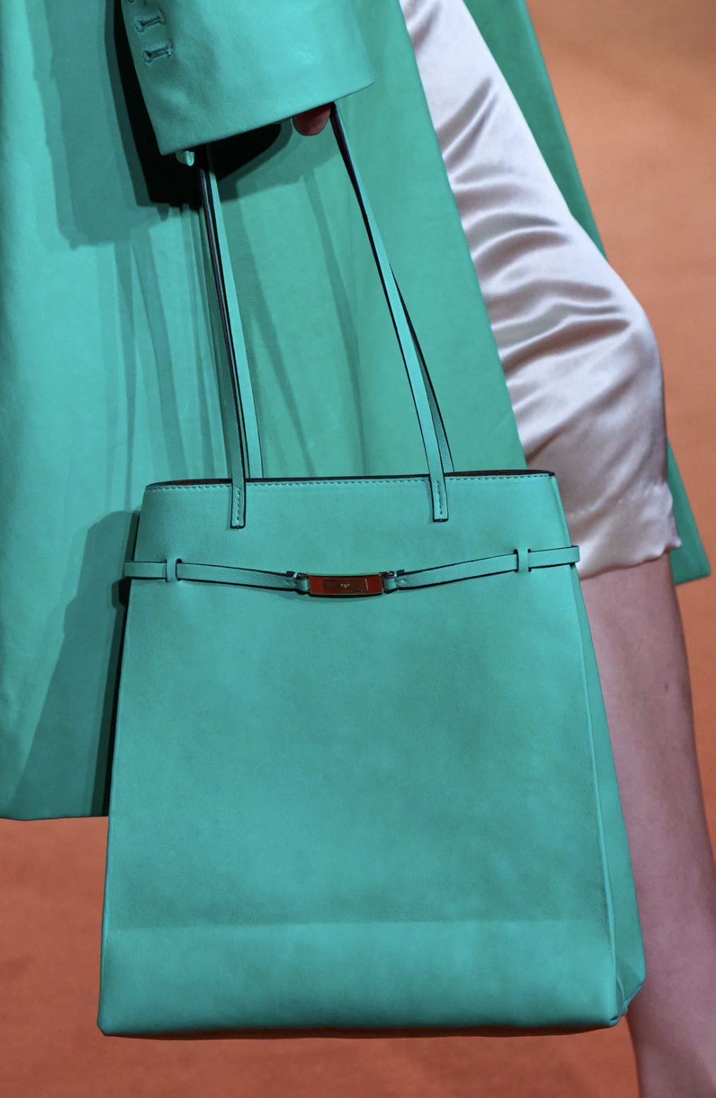 Tory Burch Spring 2027 runway tote bag in turquoise leather, an NYFW accessory trend for spring