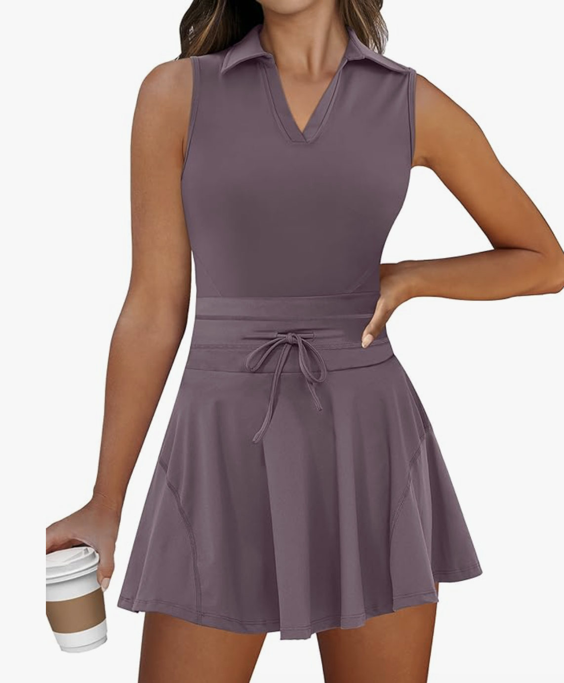 A side profile of the Caracilia Polo Neck Tennis Dress Set in a dusty purple, featuring a sleeveless collared top and a matching pleated mini skirt with a drawstring waist.