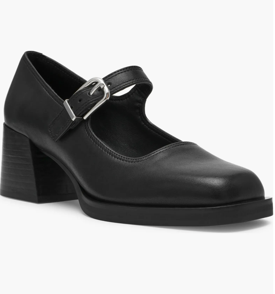 A black leather Mary Jane pump for women by Steve Madden featuring a square toe, a chunky block heel, and a single strap with a silver buckle.