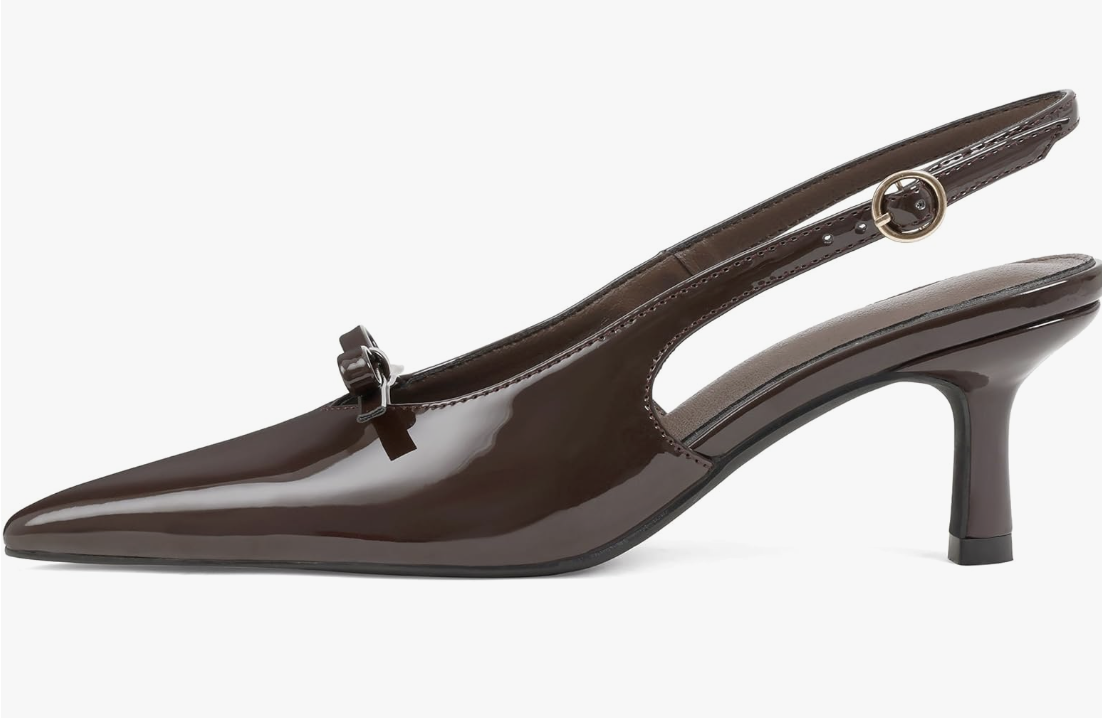 Product shot of dark brown pointed-toe slingback kitten heels with a small buckle detail, featured as a polished footwear option for styling baggy jeans.