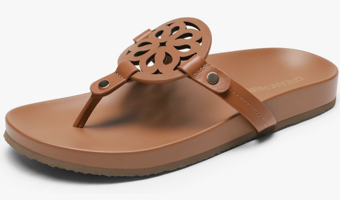A side profile of the DREAM PAIRS Platform Flip Flops in brown, featuring a thick cushioned platform sole and a decorative cutout strap design, styled as a comfortable spring footwear staple.