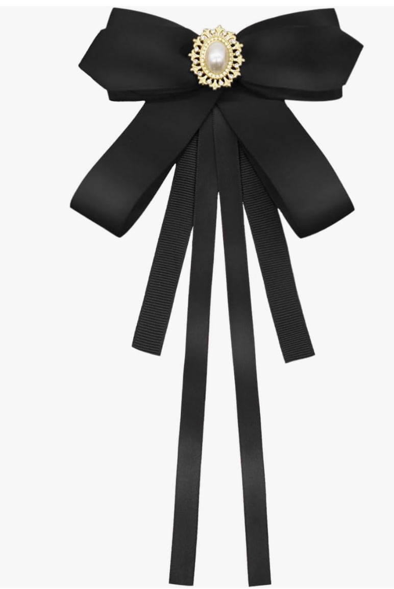 A black pre-tied bow tie clip-on with a gold center accent, styled as a sophisticated accessory for a poetcore aesthetic outfit.