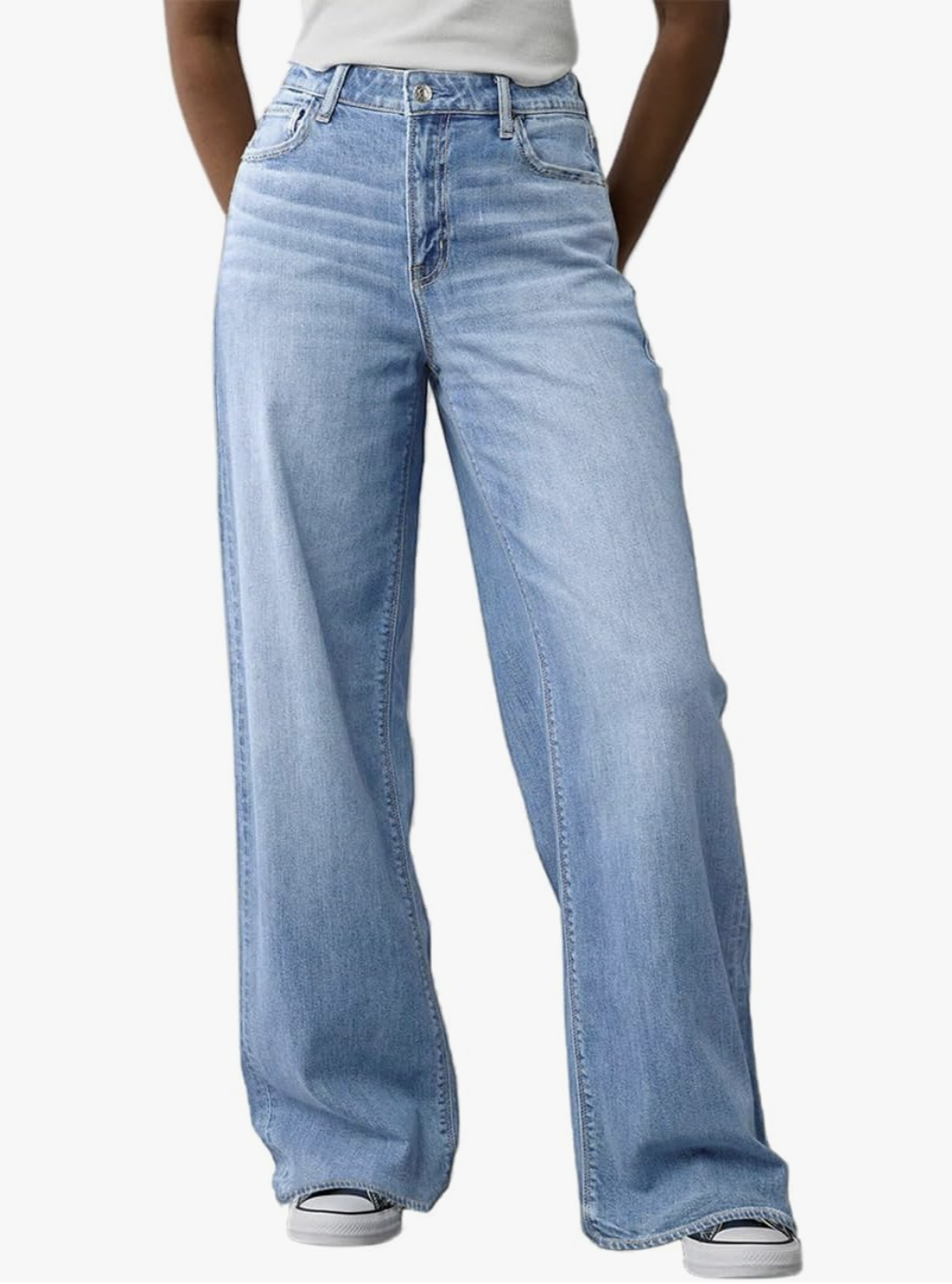 A product shot of light-wash, high-waisted baggy wide-leg jeans from Amazon, styled by a fashion editor to show a relaxed yet intentional denim silhouette.