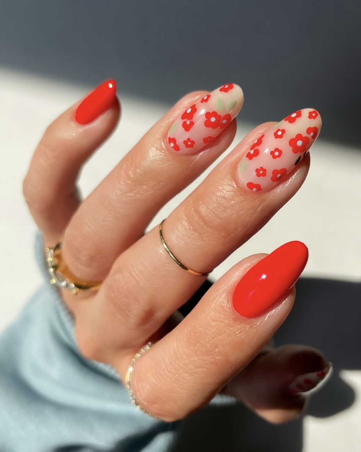 Red floral line art nail design