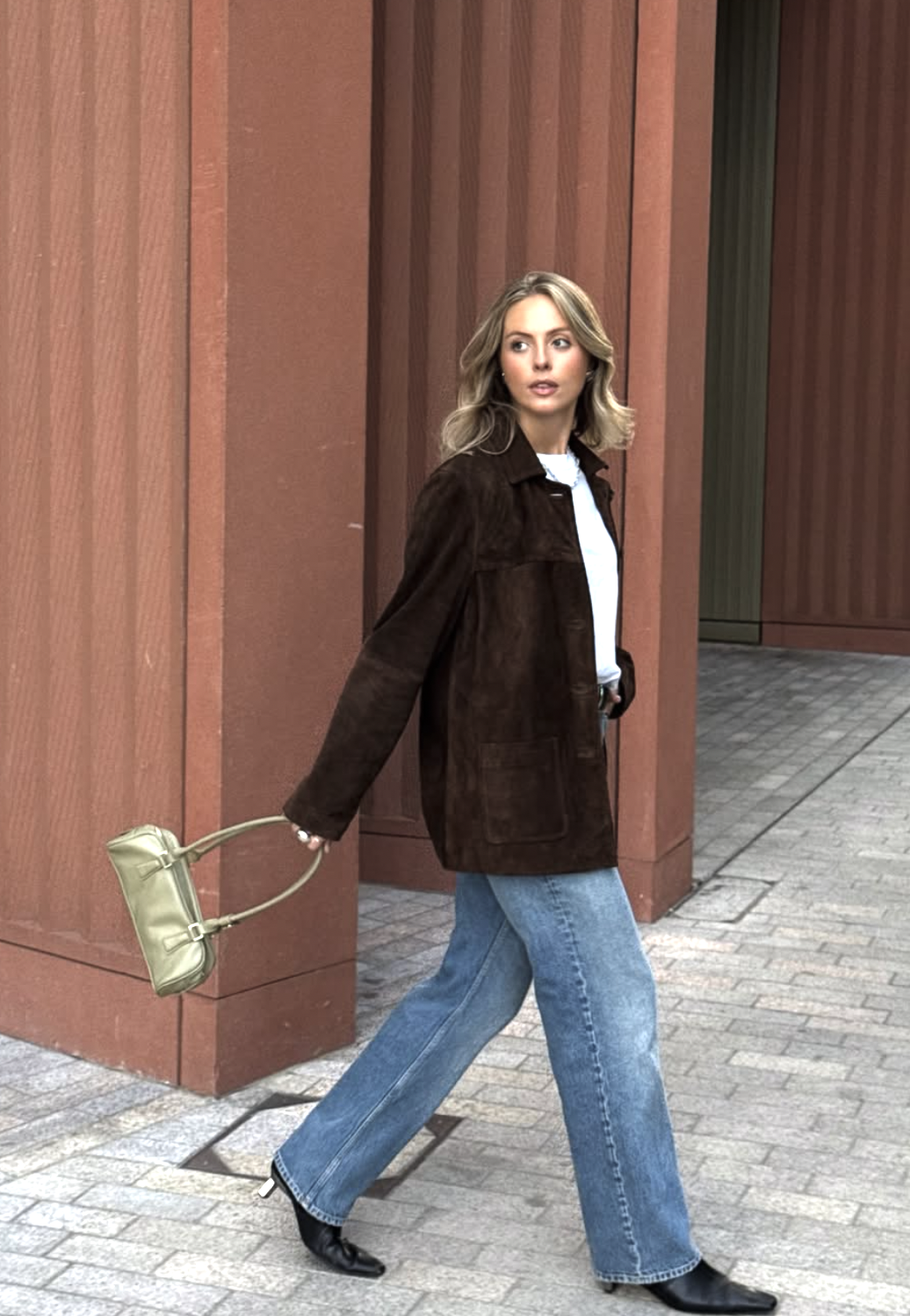 Full-length country concert outfit with straight jeans suede jacket