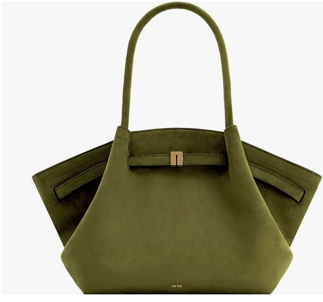 An olive green suede tote bag with flared sides, top handles, and a center strap closure.