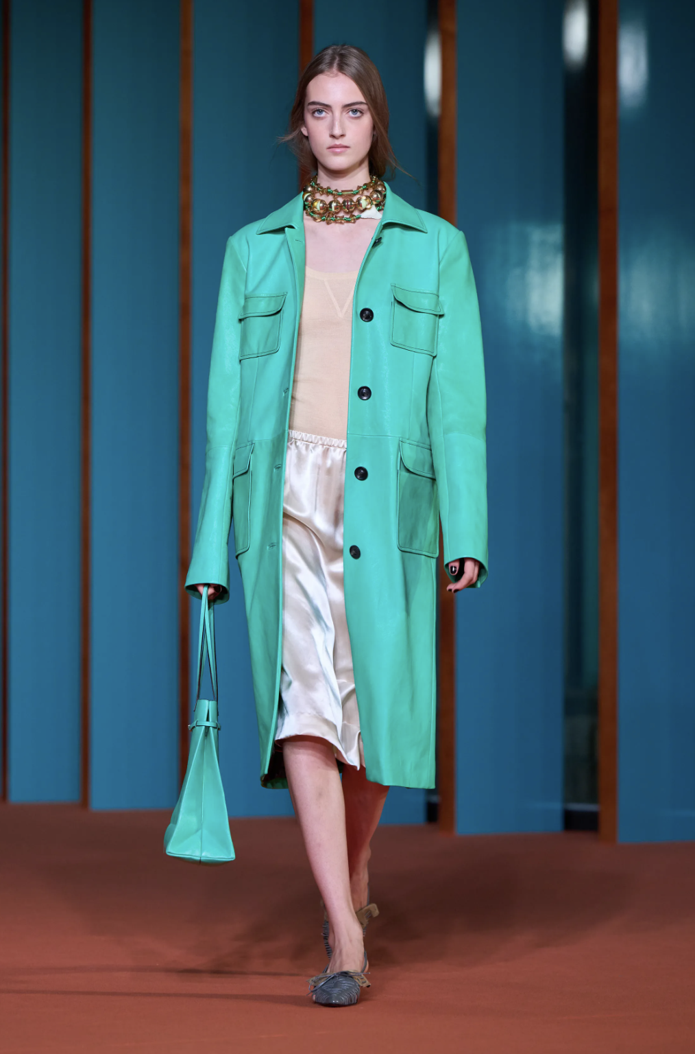Tory Burch Spring 2027 detail shot highlighting the car coat trend for fall