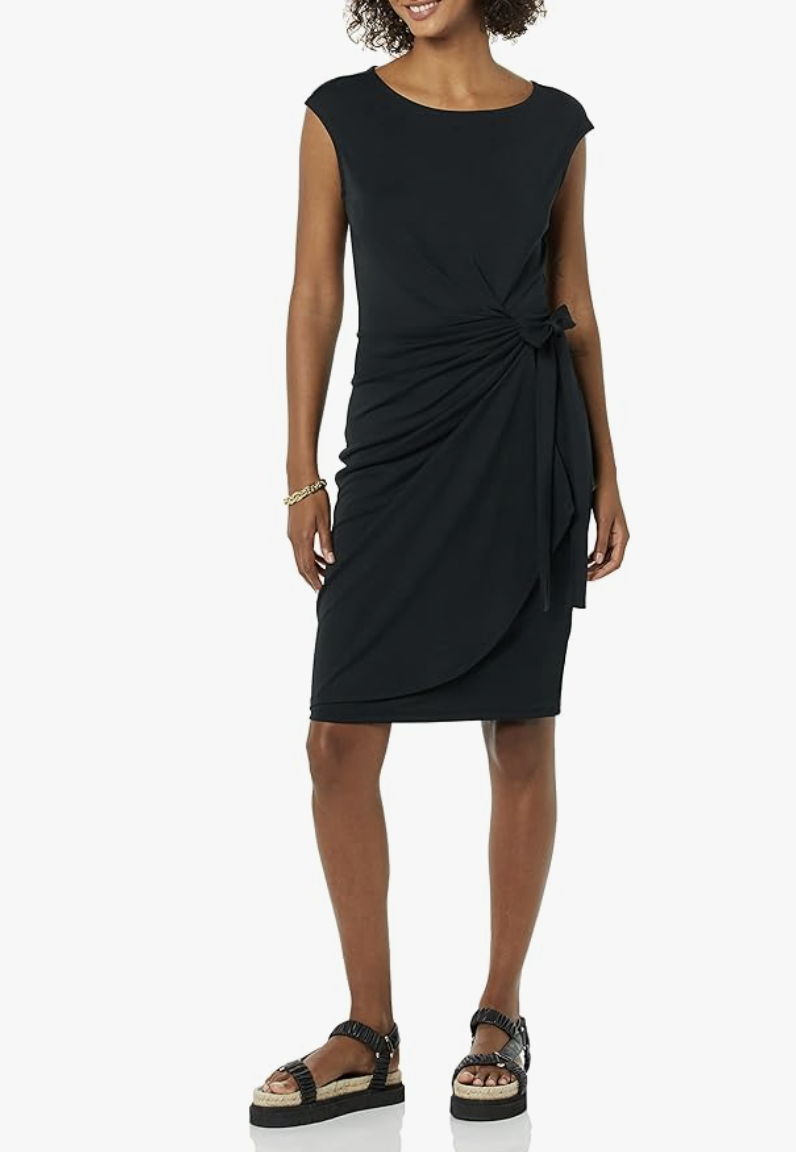 Amazon Essentials women's black cap sleeve boat-neck faux wrap dress with a side tie detail.