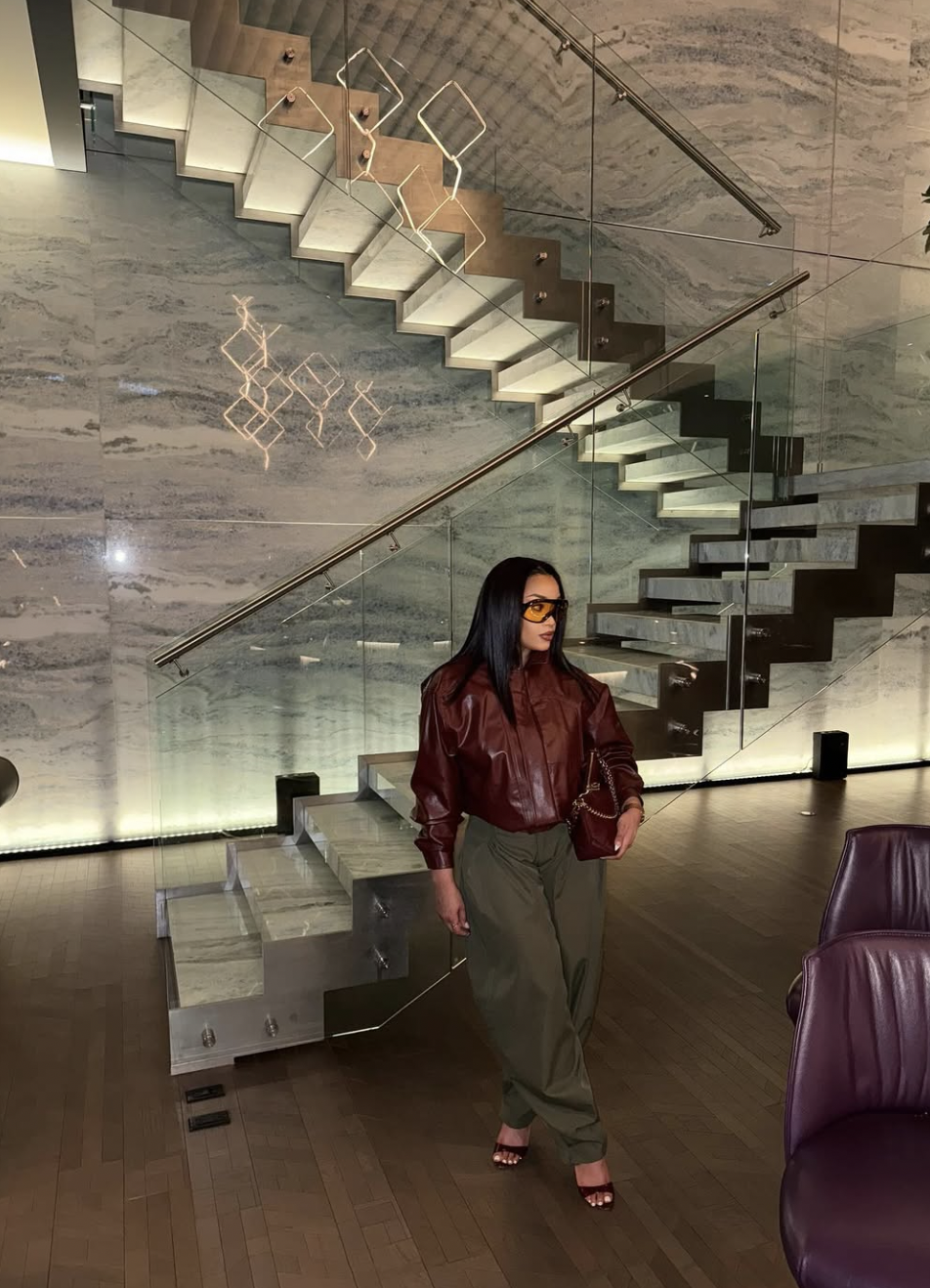 Expert color pairing showing a burgundy shirt worn with hunter green trousers.