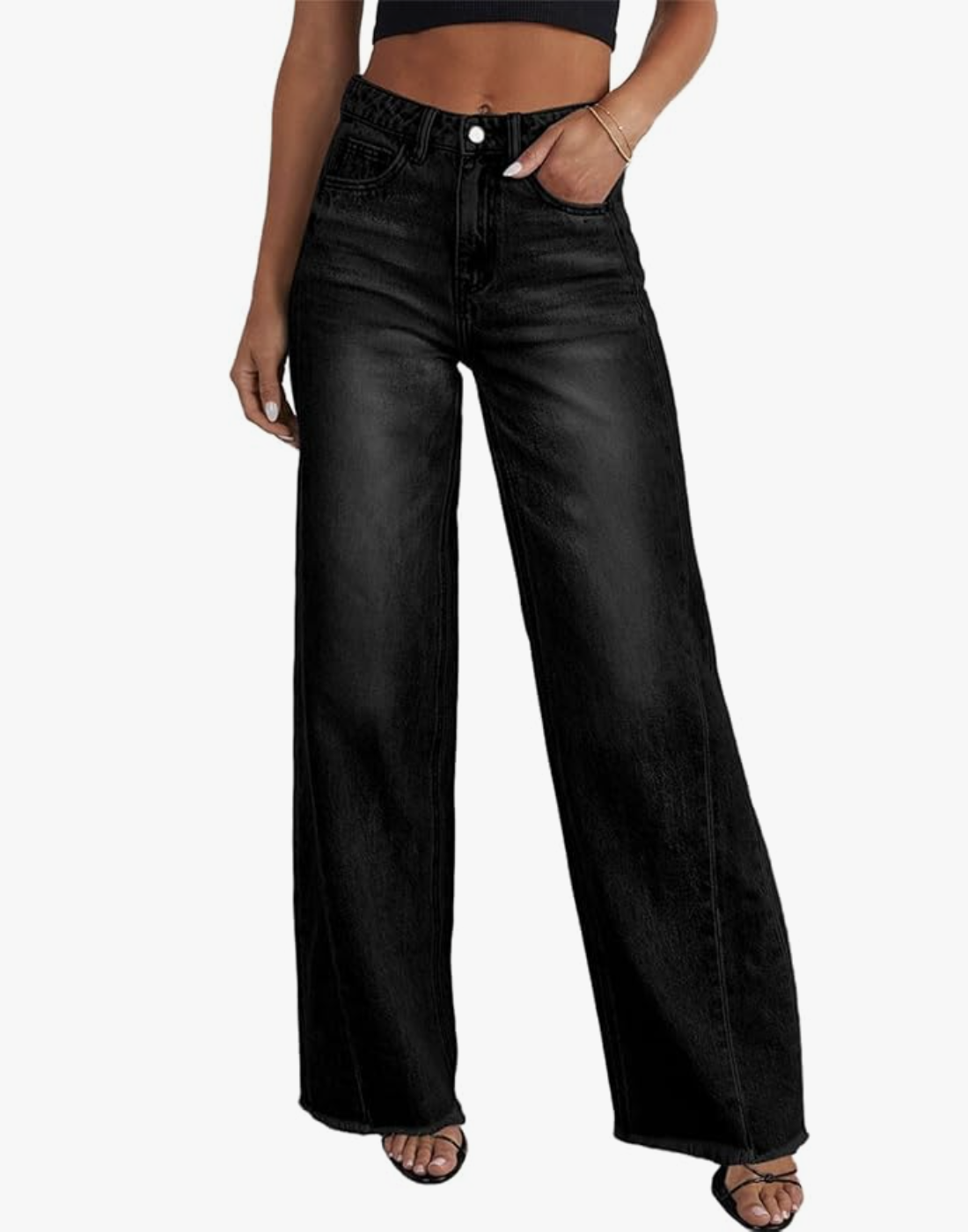 A person wearing high-waisted wide-leg jeans in a dark charcoal wash with a relaxed fit and clean hem.