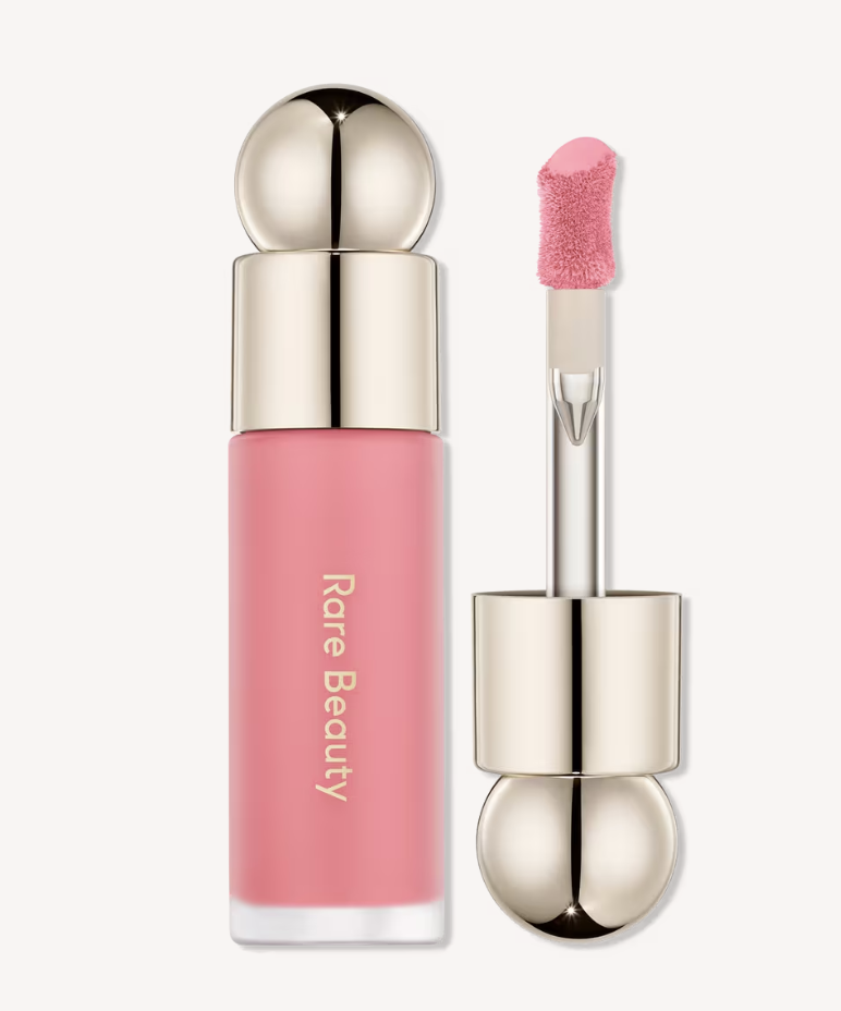 Rare Beauty Soft Pinch Liquid Blush with a high-pigment doe-foot applicator.
