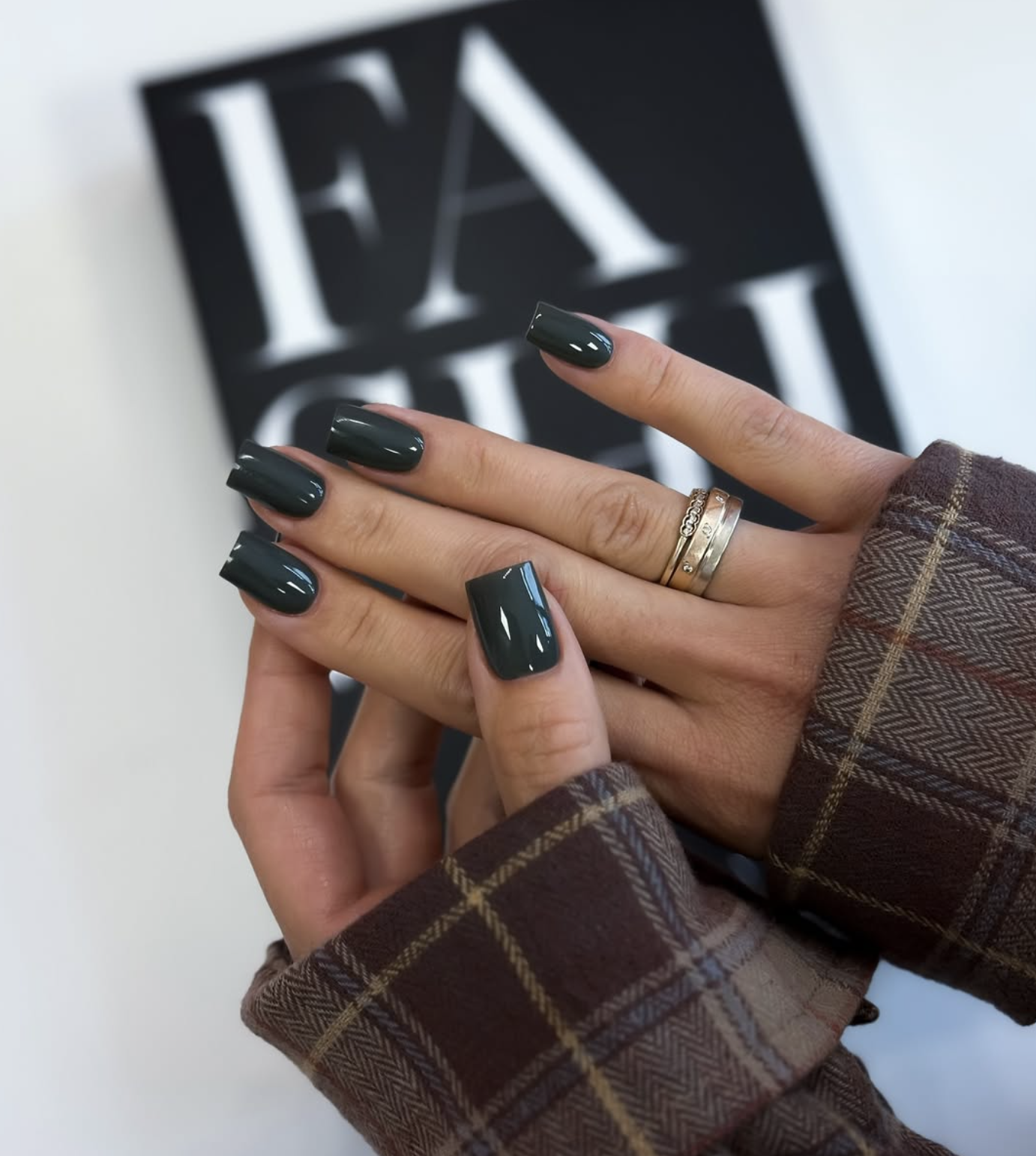 Short forest green nails for winter with a glossy finish