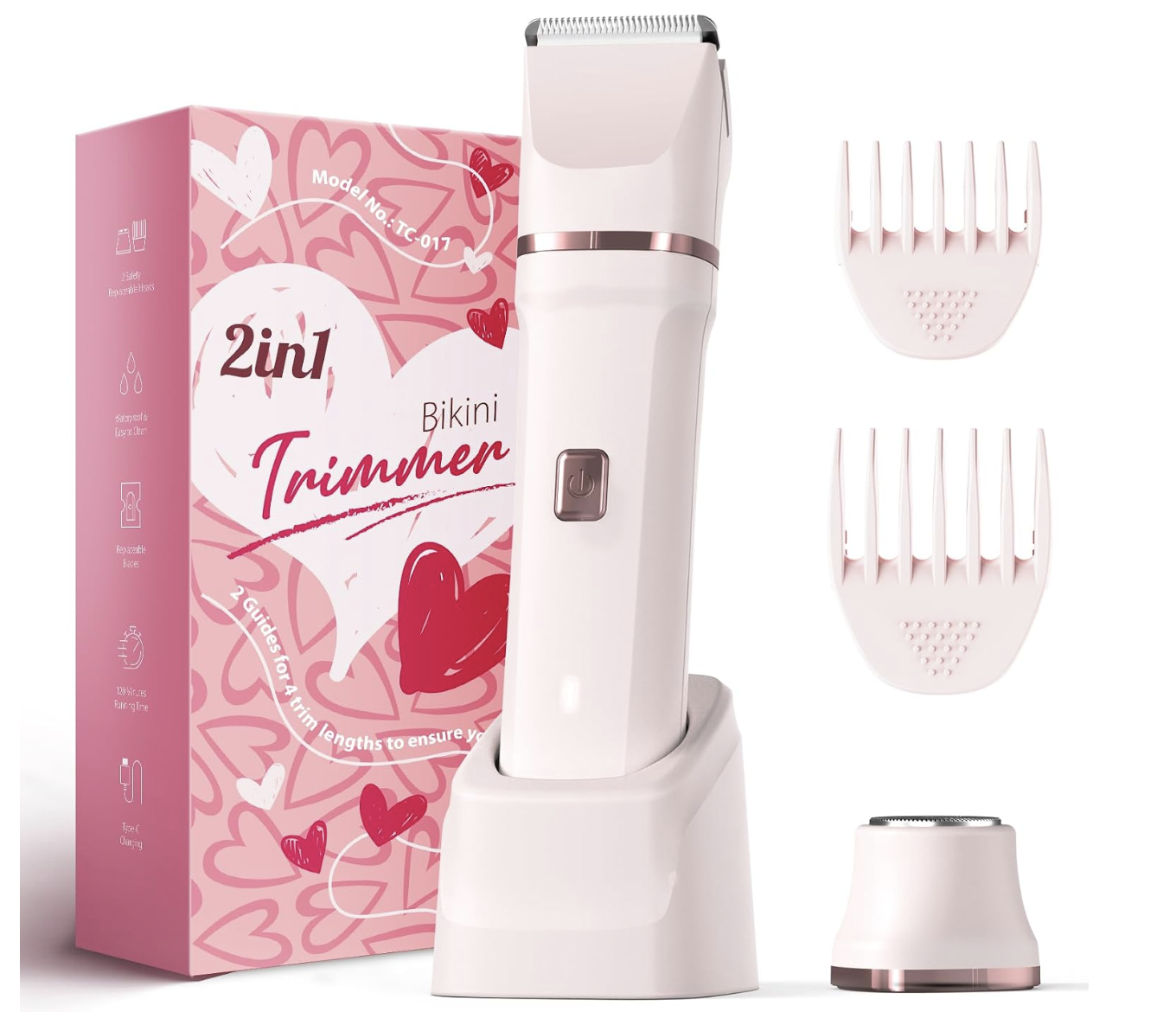 Pink Risina 2-in-1 Bikini Trimmer on its charging stand with two guard combs, a spare head and its pink heart-print box.