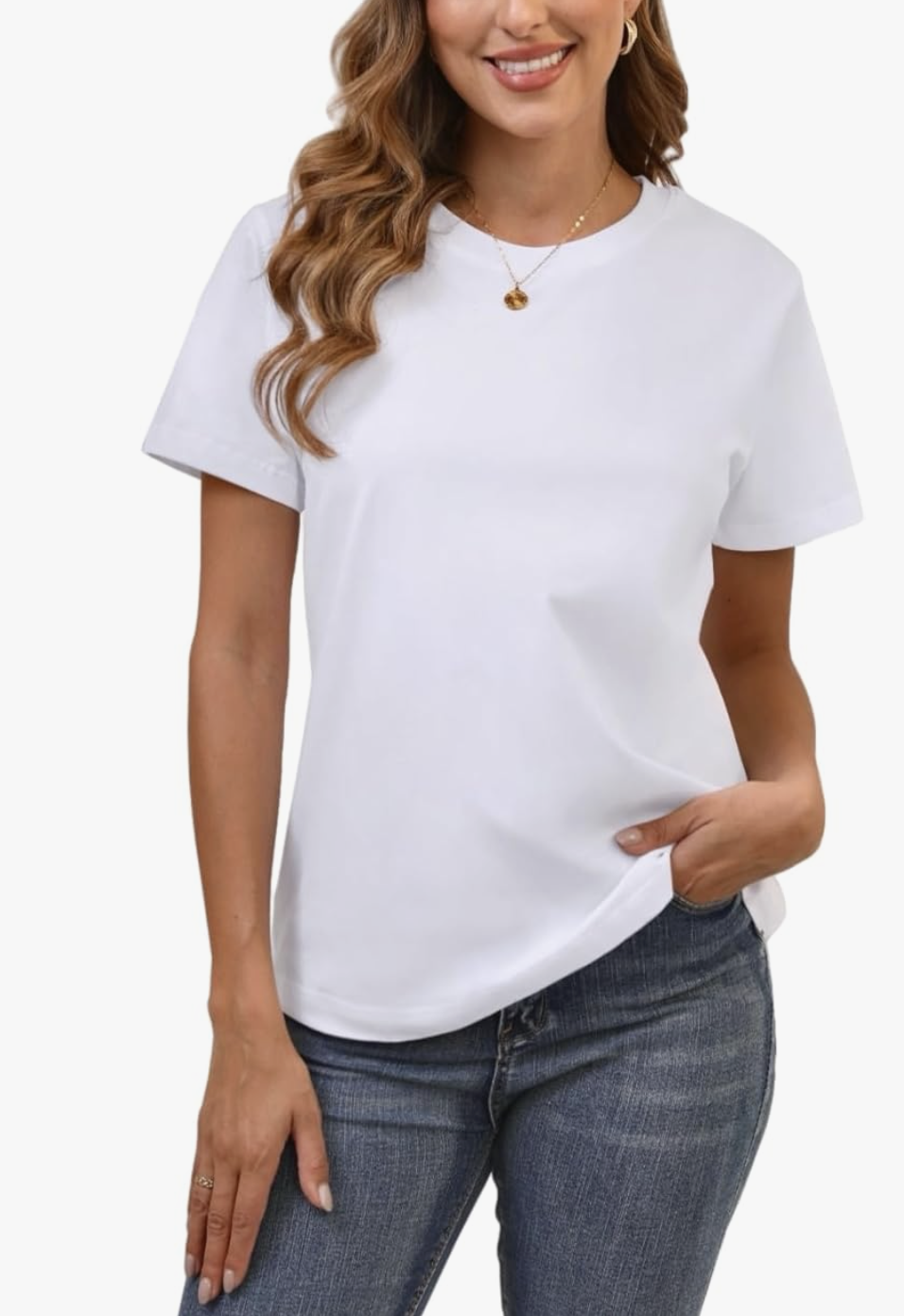Front view of a woman wearing a classic white short-sleeve crewneck t-shirt tucked into blue jeans.