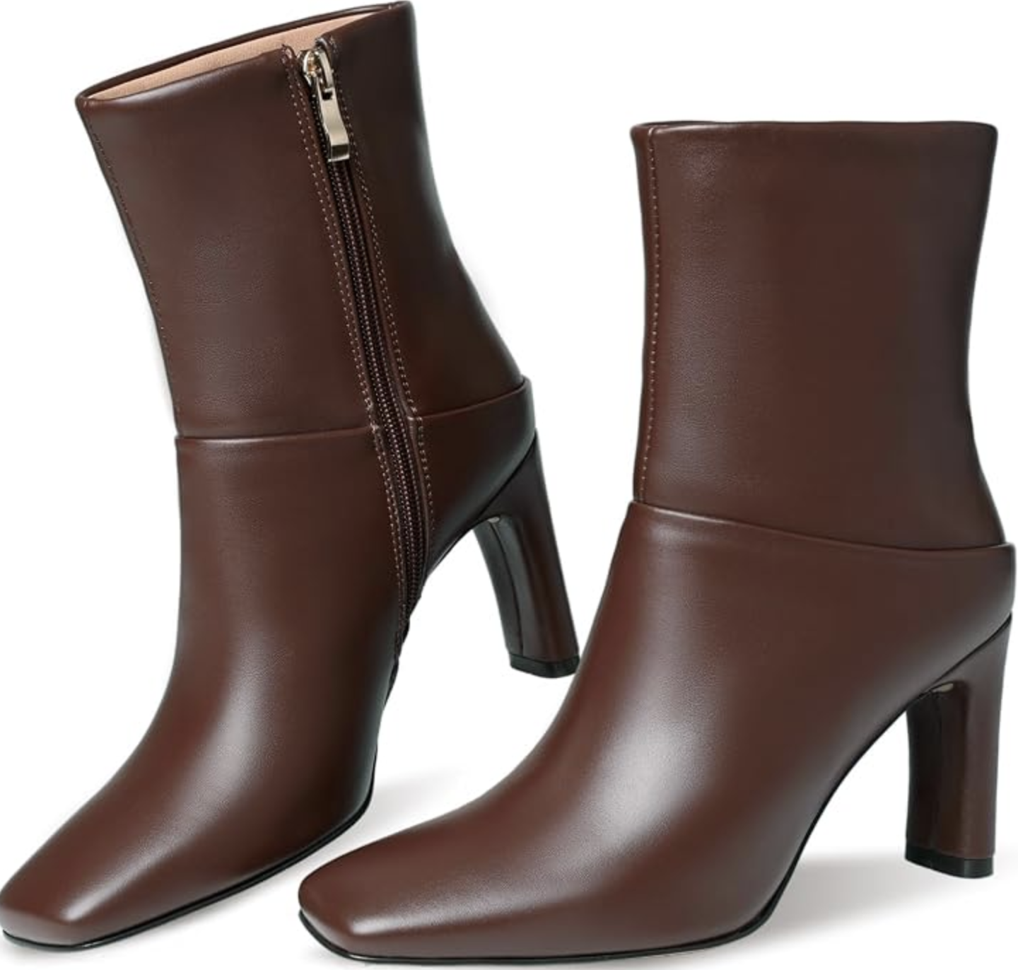 Dark brown leather pointed-toe ankle boots with side zippers.