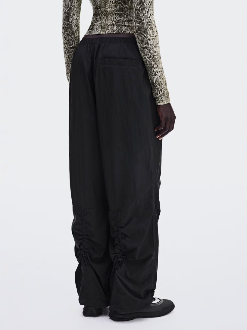 Black ruched lightweight jacket and matching pants from the Zendaya and Law Roach On collection.
