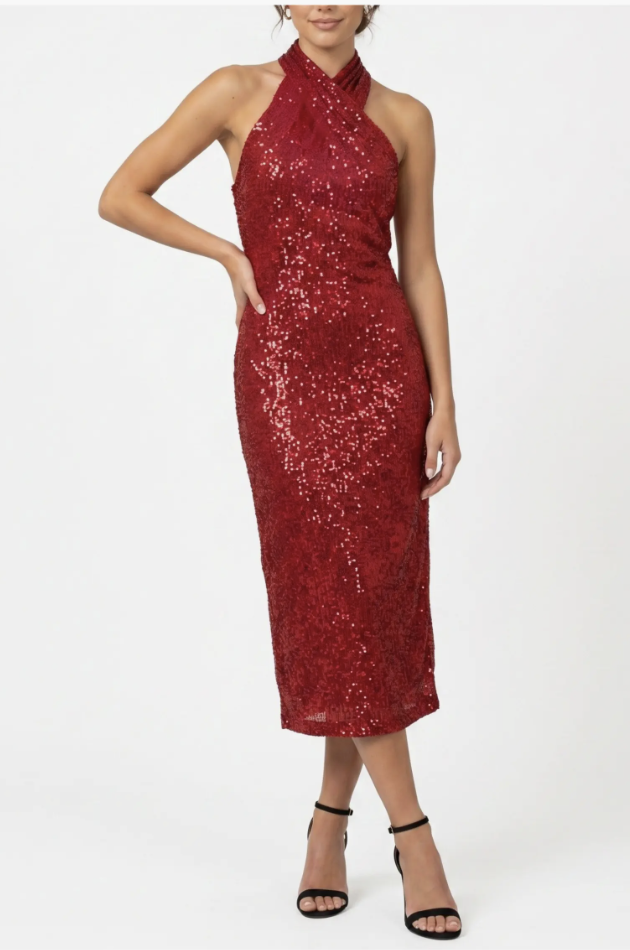Red long-sleeve midi dress with black heels and black clutch.