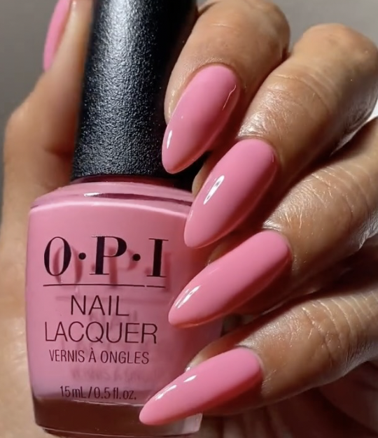 Close-up of a glossy, milky-pink manicure using OPI'm a Bubble Bunny from the New OPIcons Spring 2026 collection.