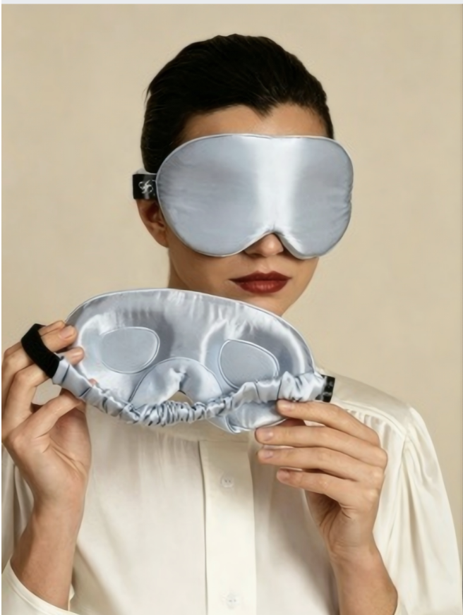 Soft contoured sleep mask packed for a flight