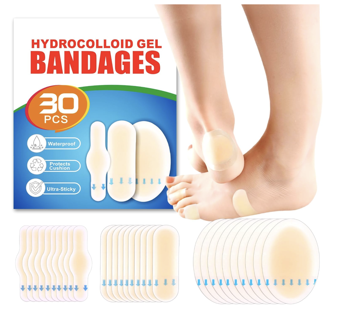 Blister bandages packed beside travel shoes
