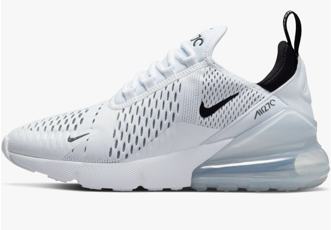 A side profile of a white Nike Air Max 270 sneaker with black accents, featuring a signature large clear air bubble heel and breathable mesh upper.