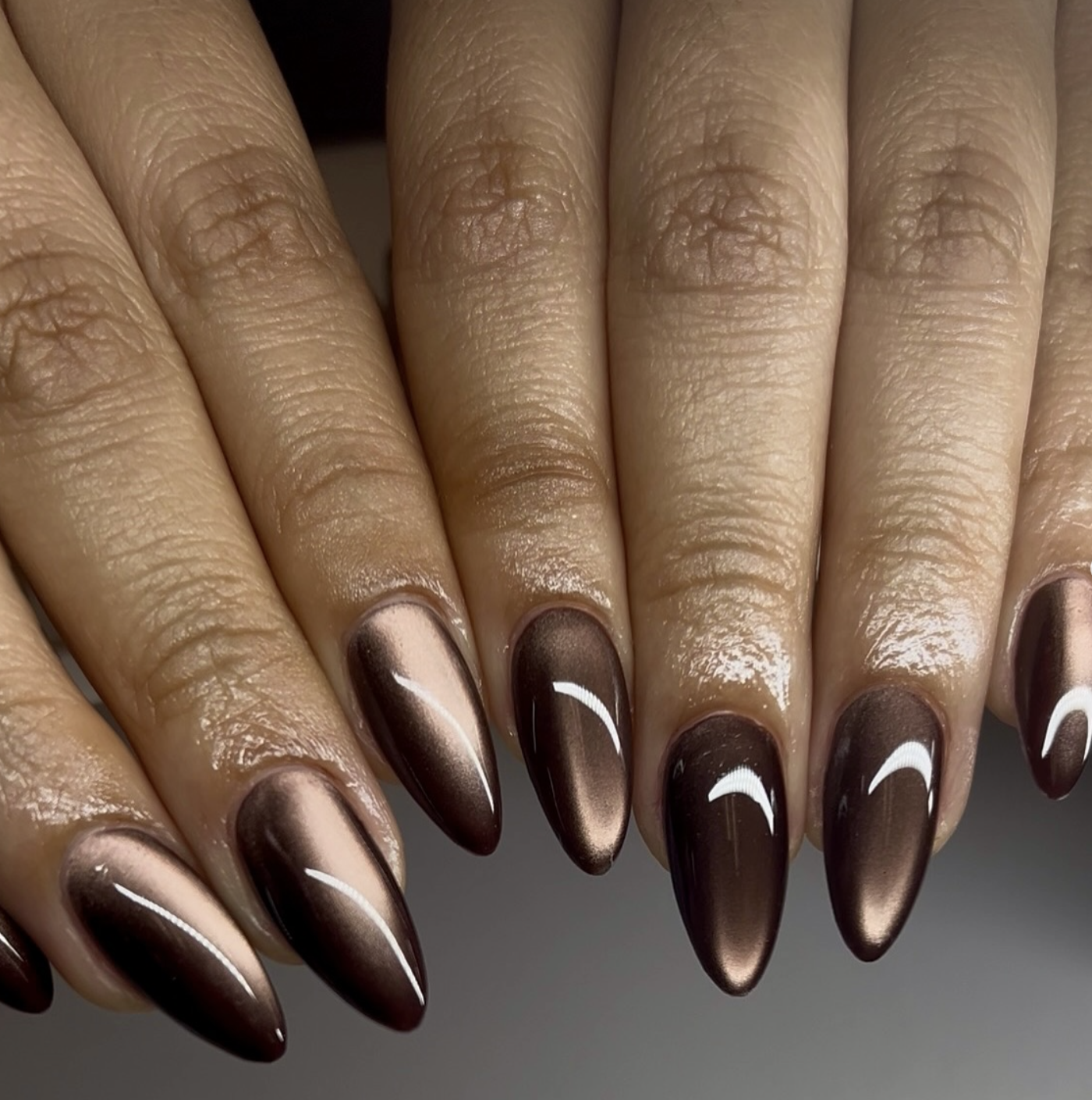 Cocoa-centered reverse aura nails with creamy edges. rust-short-squoval-aura-nails.jpg — Short squoval nails with a diffused rust-colored aura.