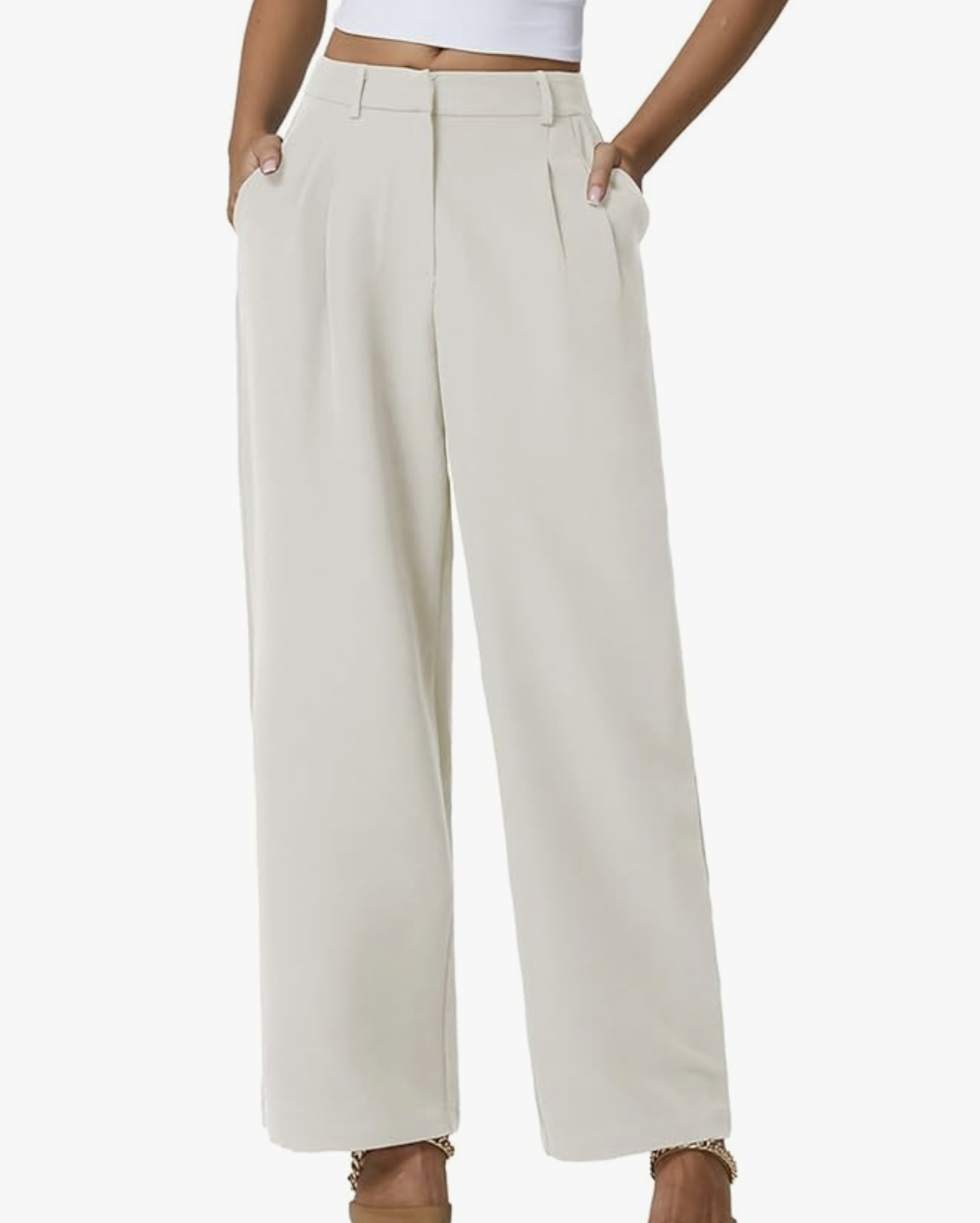 A pair of pro stylist-recommended white high-waisted trousers, styled as a clean and modern base for layered outfits.