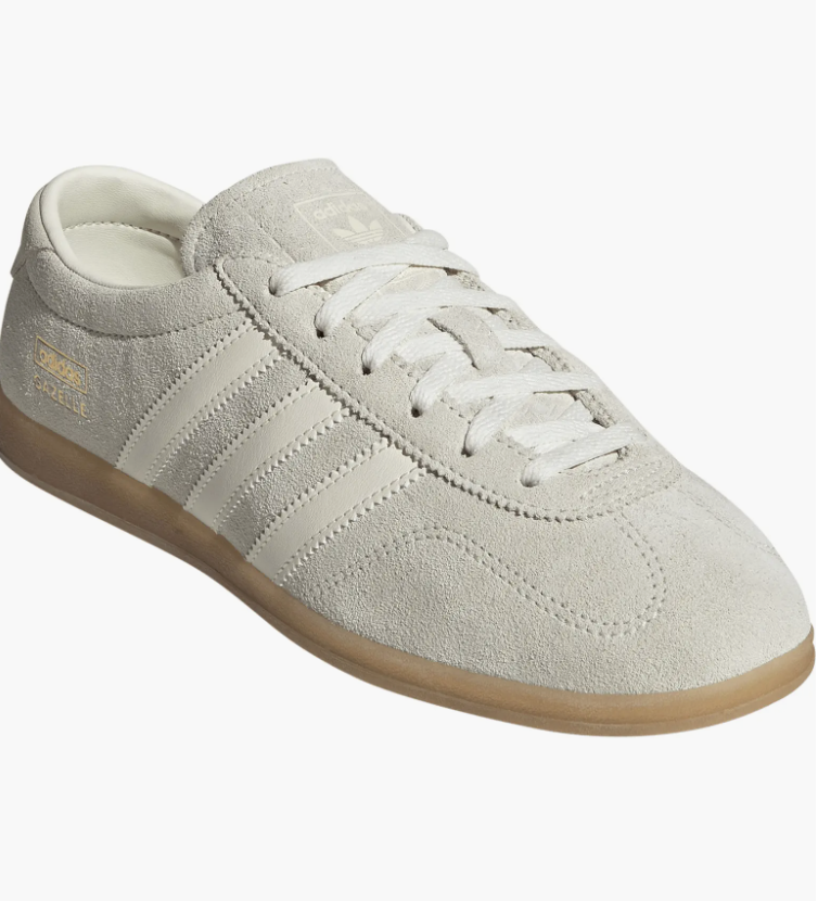 Adidas Gazelle Lo Pro sneakers with white stripes, styled for a professional and modern office outfit.