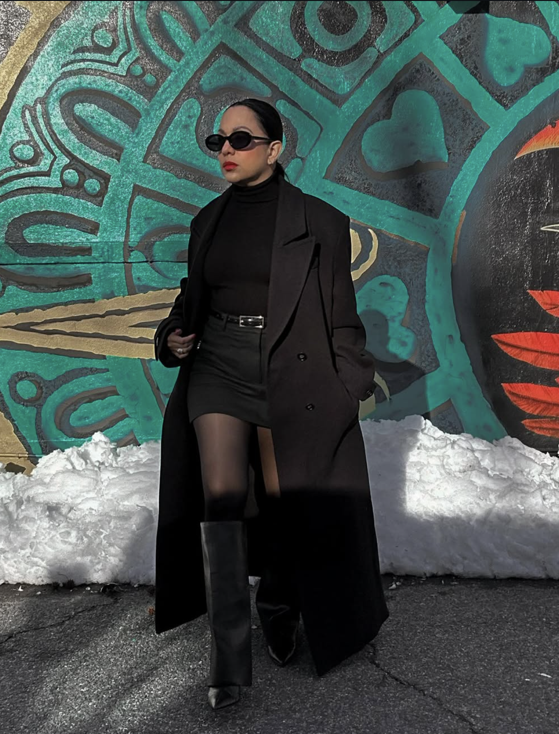 Full-length tailored shorts tall boots outfit showing the complete boot shaft and shoes