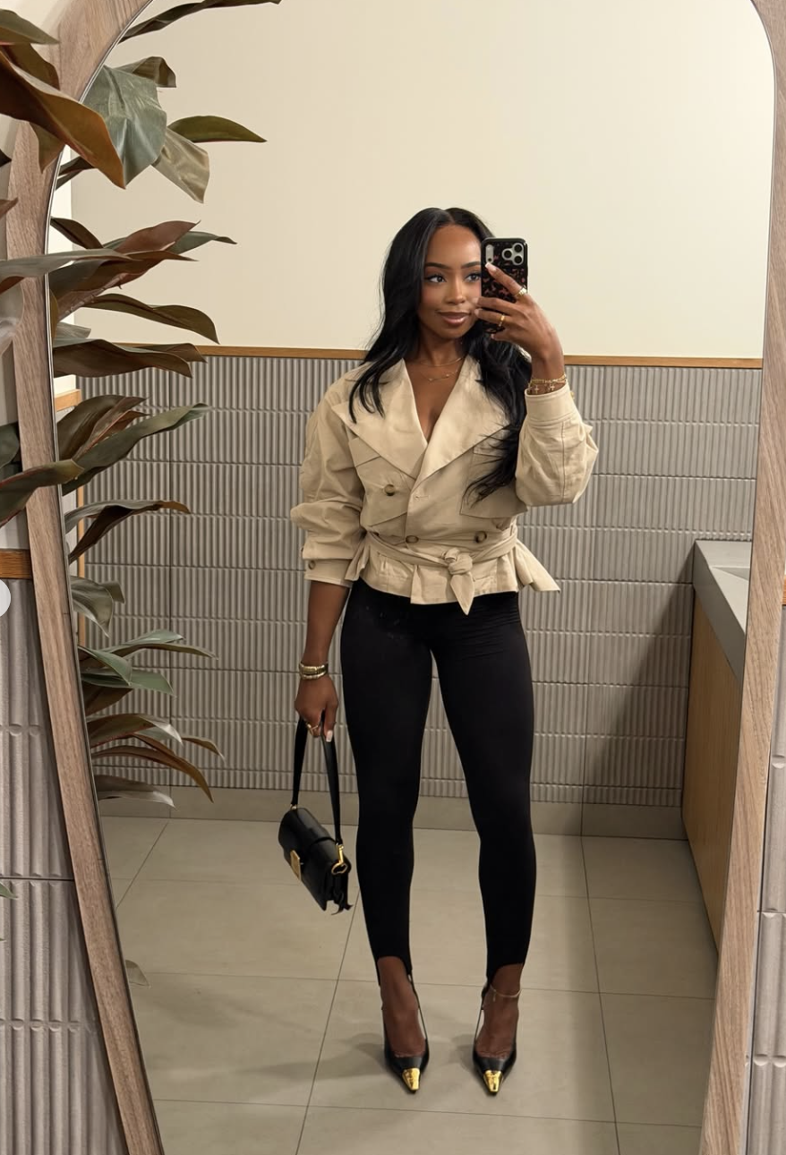 A fashion editor-approved outfit featuring black cropped pants paired with black pointed-toe mules with gold hardware, showing how backless shoes keep the ankle visually light.