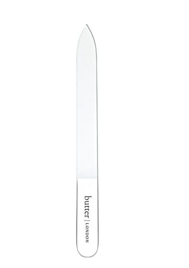 Glass nail file stored in a protective sleeve