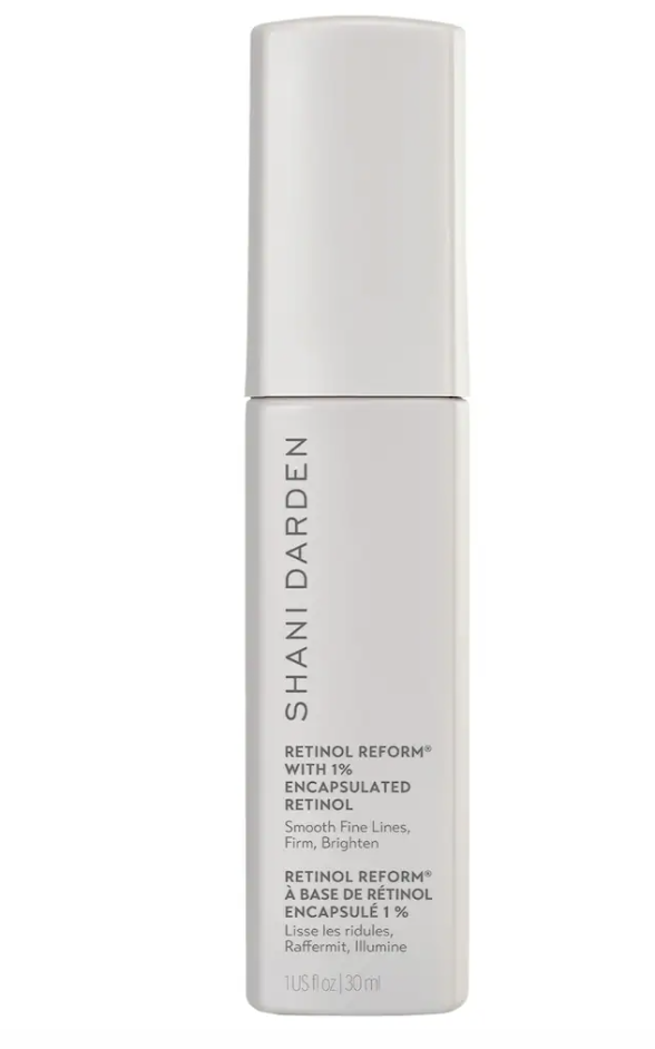 Shani Darden Skin Care Retinol Reform bottle with detailed label showing 1% encapsulated retinol and lactic acid for smoothing fine lines on melanin-rich skin.