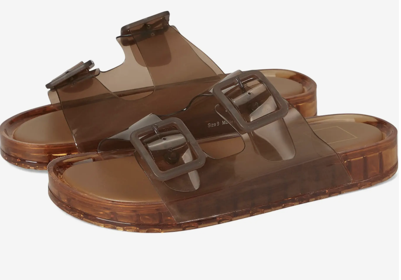 Dolce Vita Julio Sandals in Whiskey brown featuring translucent adjustable double buckles, a cushioned leather insole, and a textured rubber traction outsole.